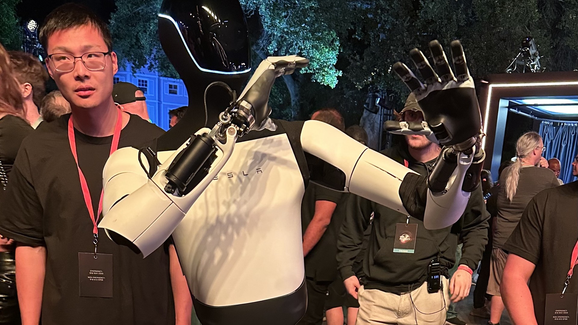 Tesla Optimus Gen 2 humanoid robot at a public event